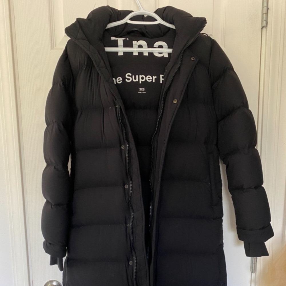 TNA Super Puff Long in Black!